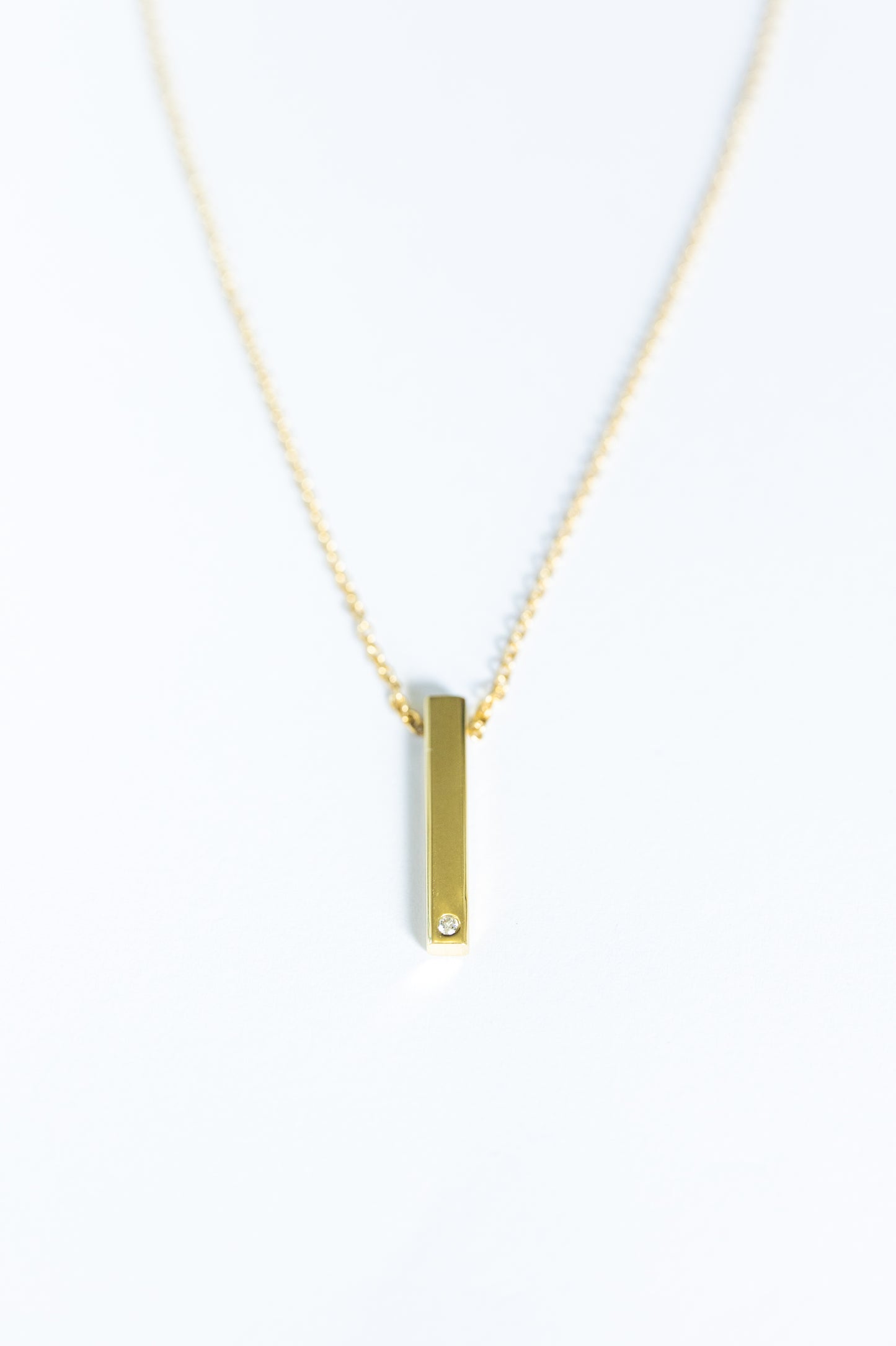 Defining Lines Single Bar One Diamond Pendant